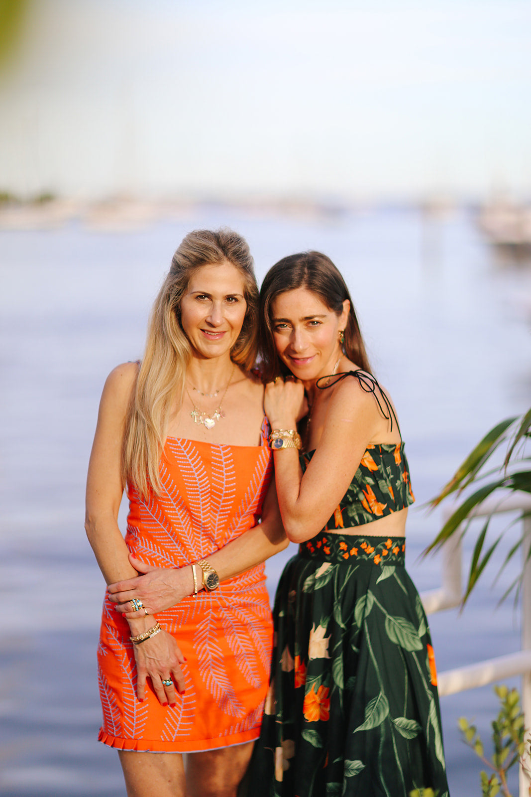 Emily and Ashley Green together by the water